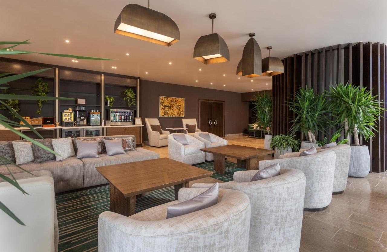 Suite Grand con balcón y vistas parciales al océano - 1 cama extragrande