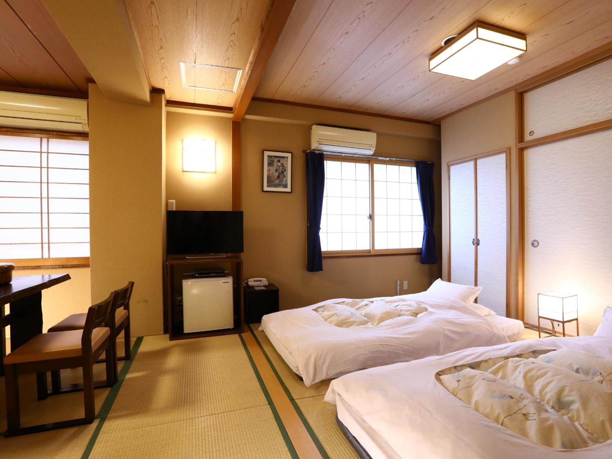 Japanese-Style Deluxe Room Futon count varies by the number of guests at
