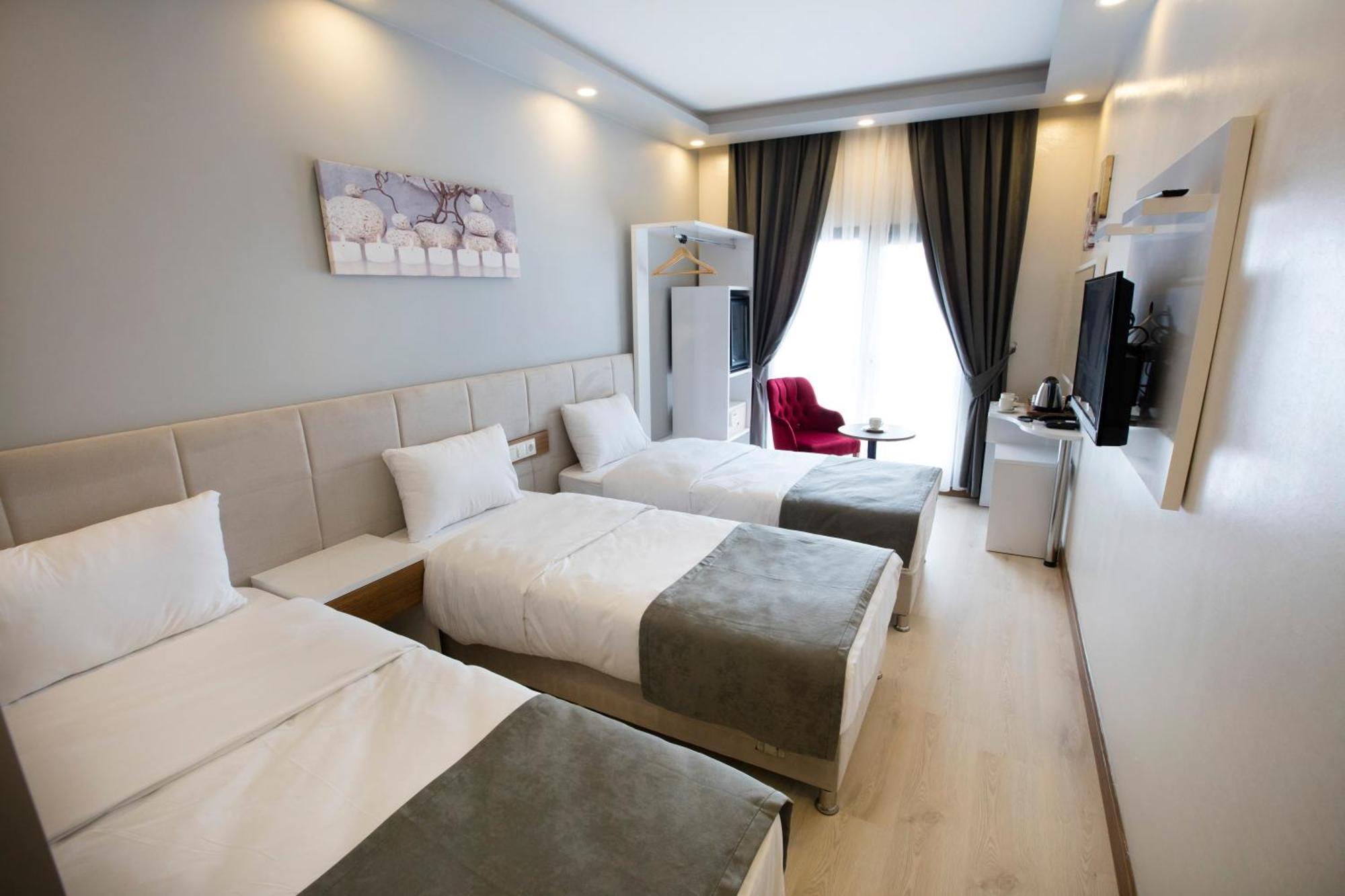 Deluxe Triple Room