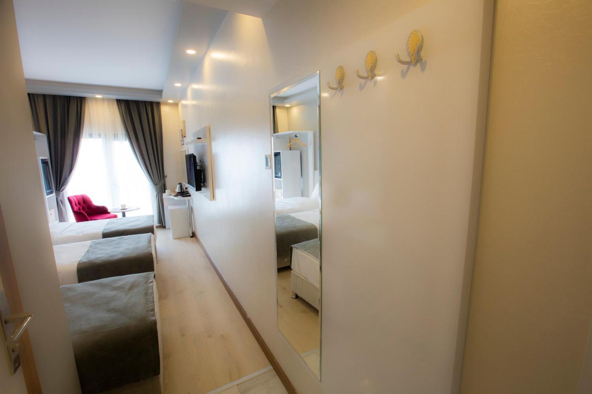 Deluxe Triple Room