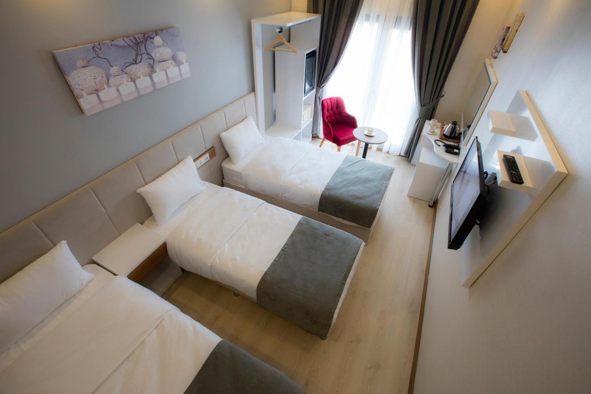 Deluxe Triple Room