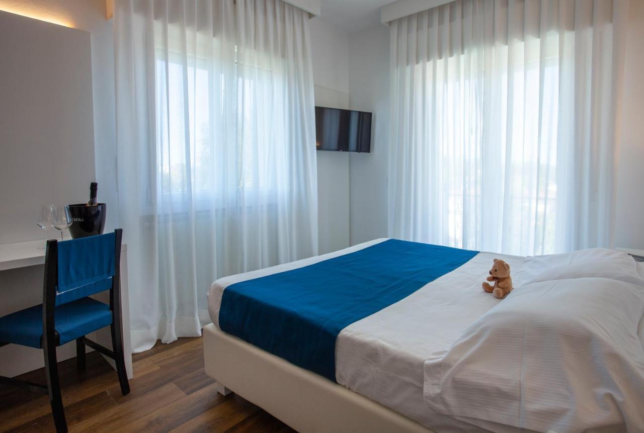 Dreibettzimmer mit Balkon