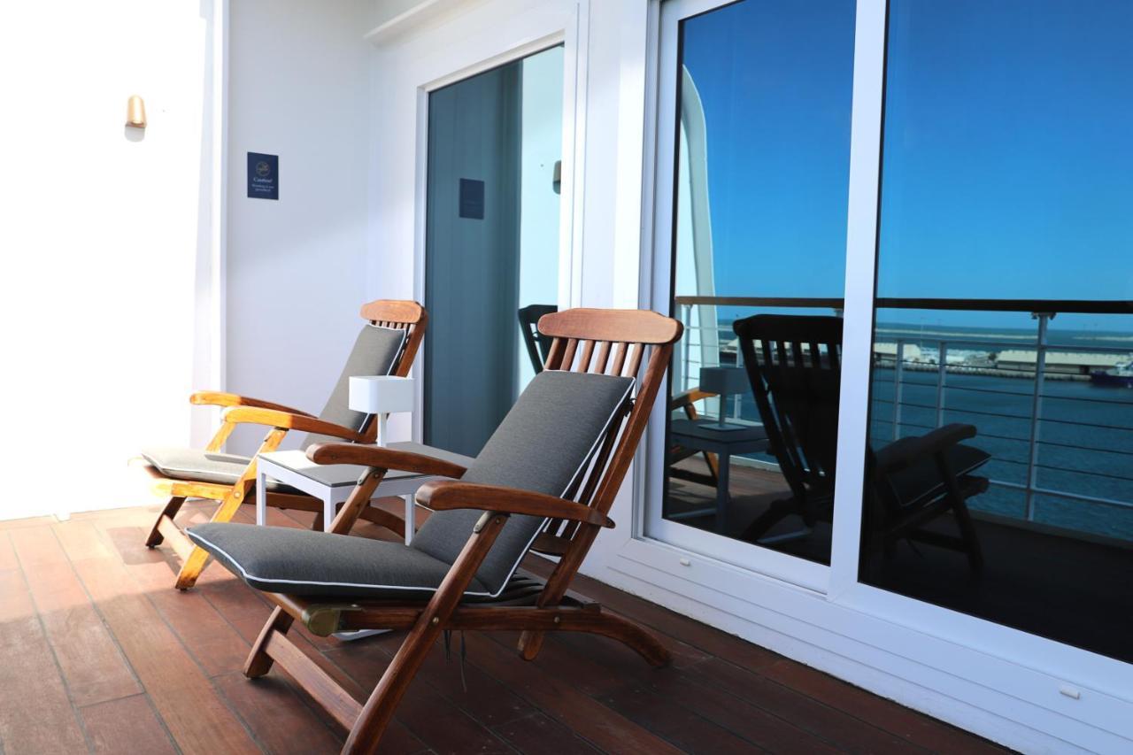 Kapiteinskamer met 1 kingsize bed en balkon