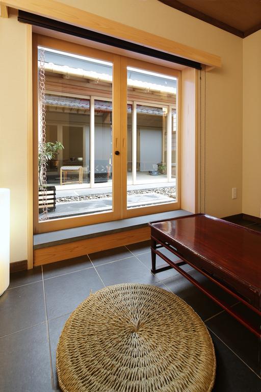 Camera in Stile Giapponese Doppia con Letti Singoli con Loft e Vista Giardino
