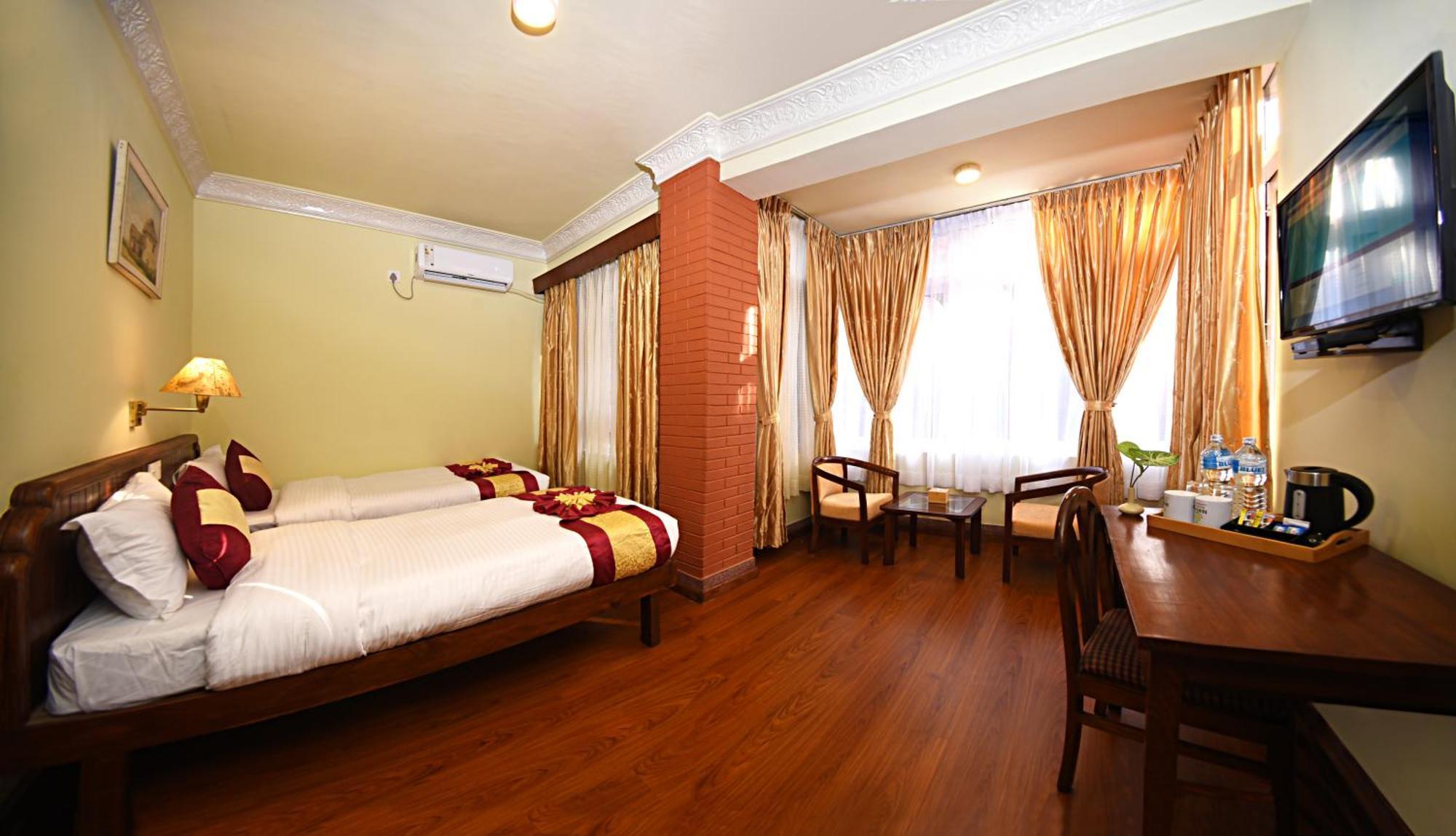 Quarto Standard com Cama de Casal ou 2 de Solteiro