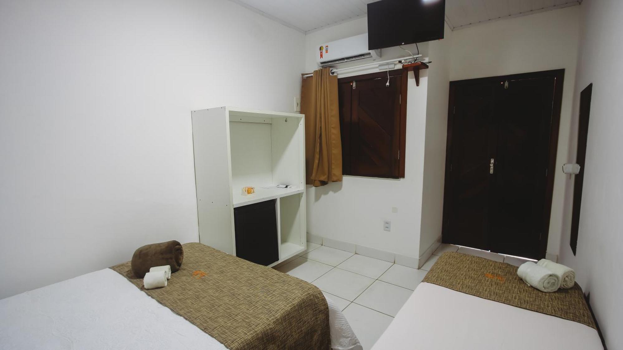 Quarto Triplo Executivo