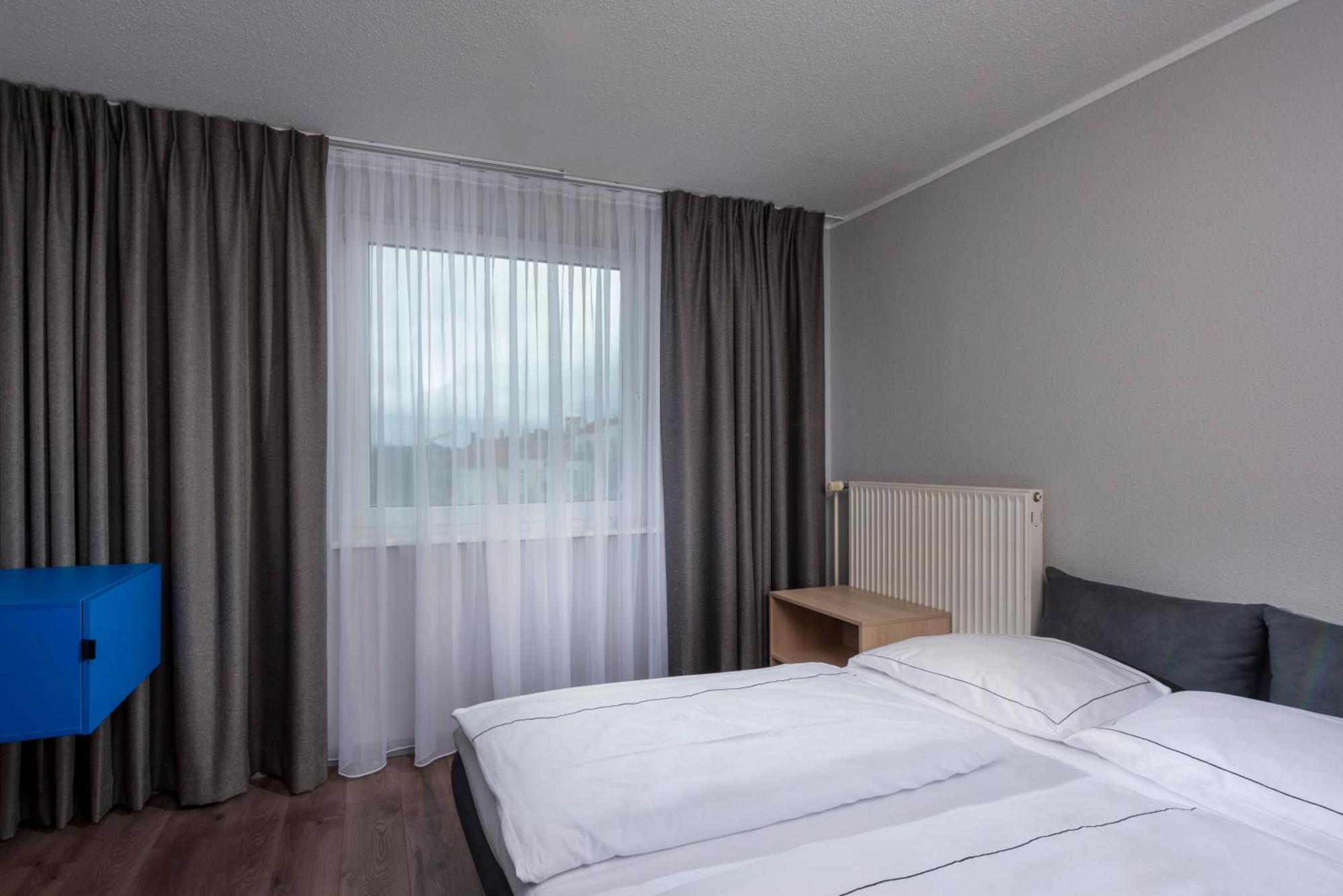 Family Suite with Two Single Beds and  Sofa,1588044690:JPEG