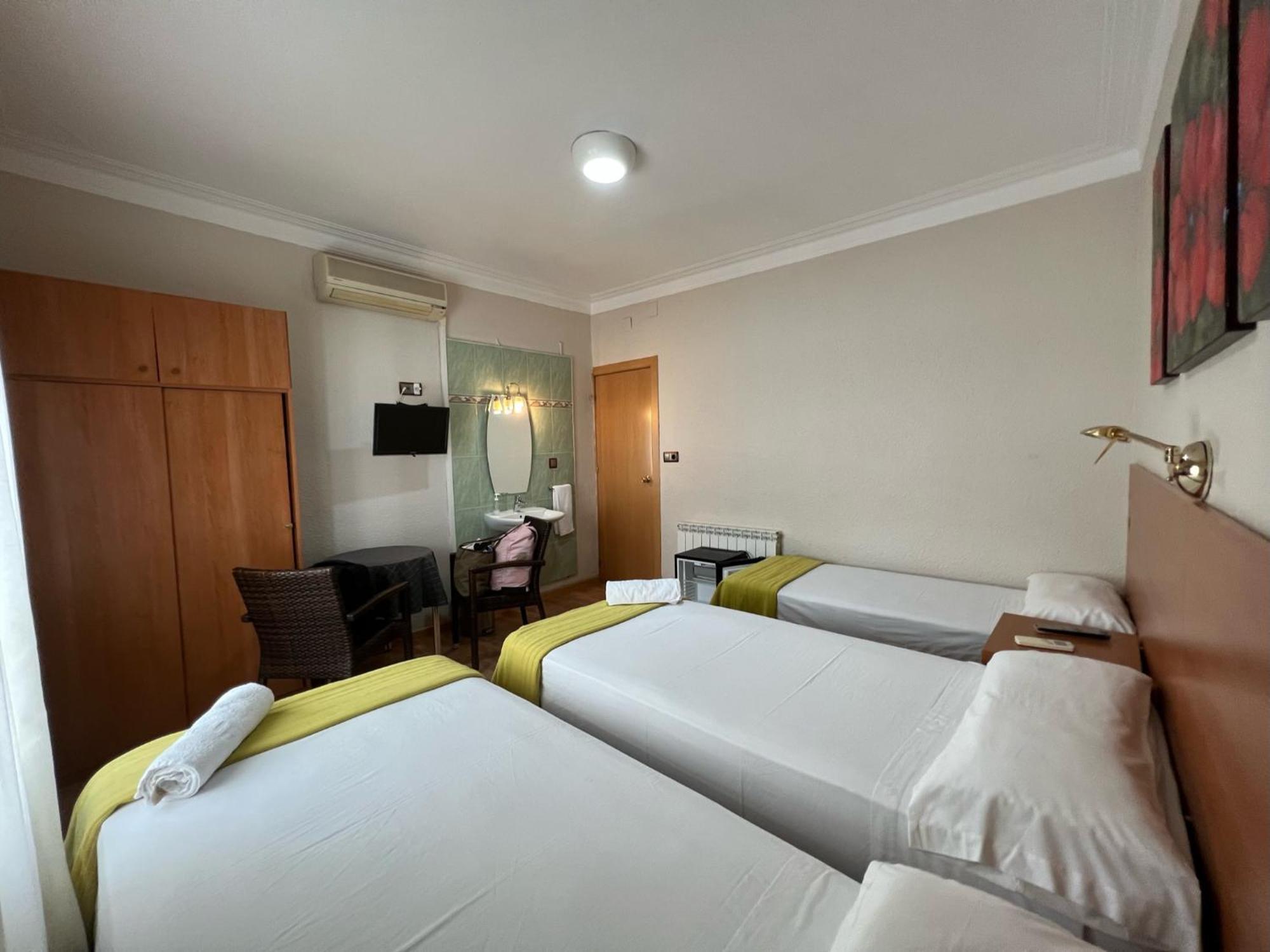 Habitación Triple con balcón