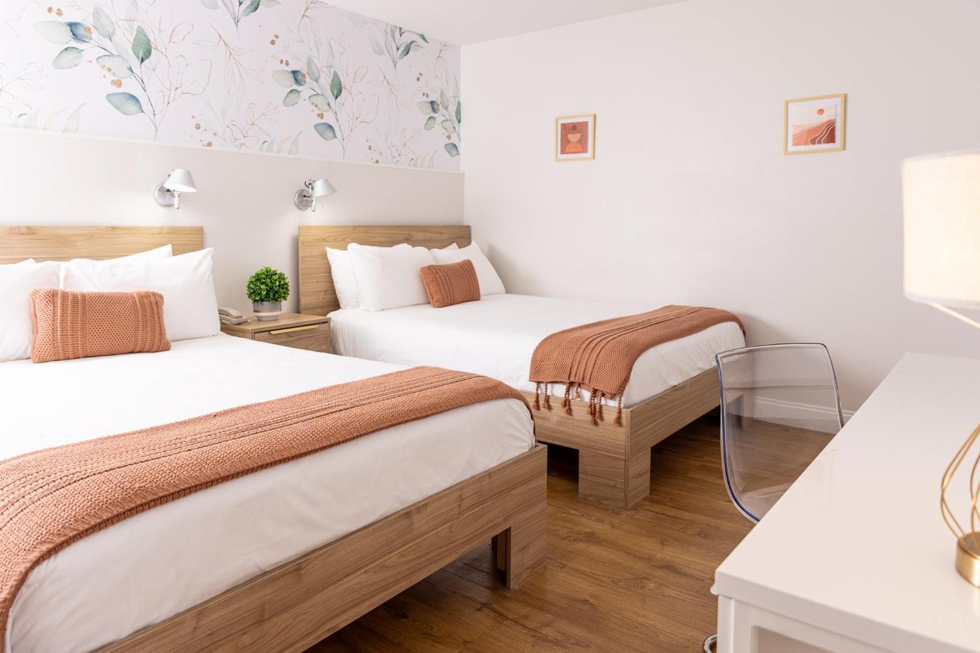 Deluxe Double Two Queen Beds