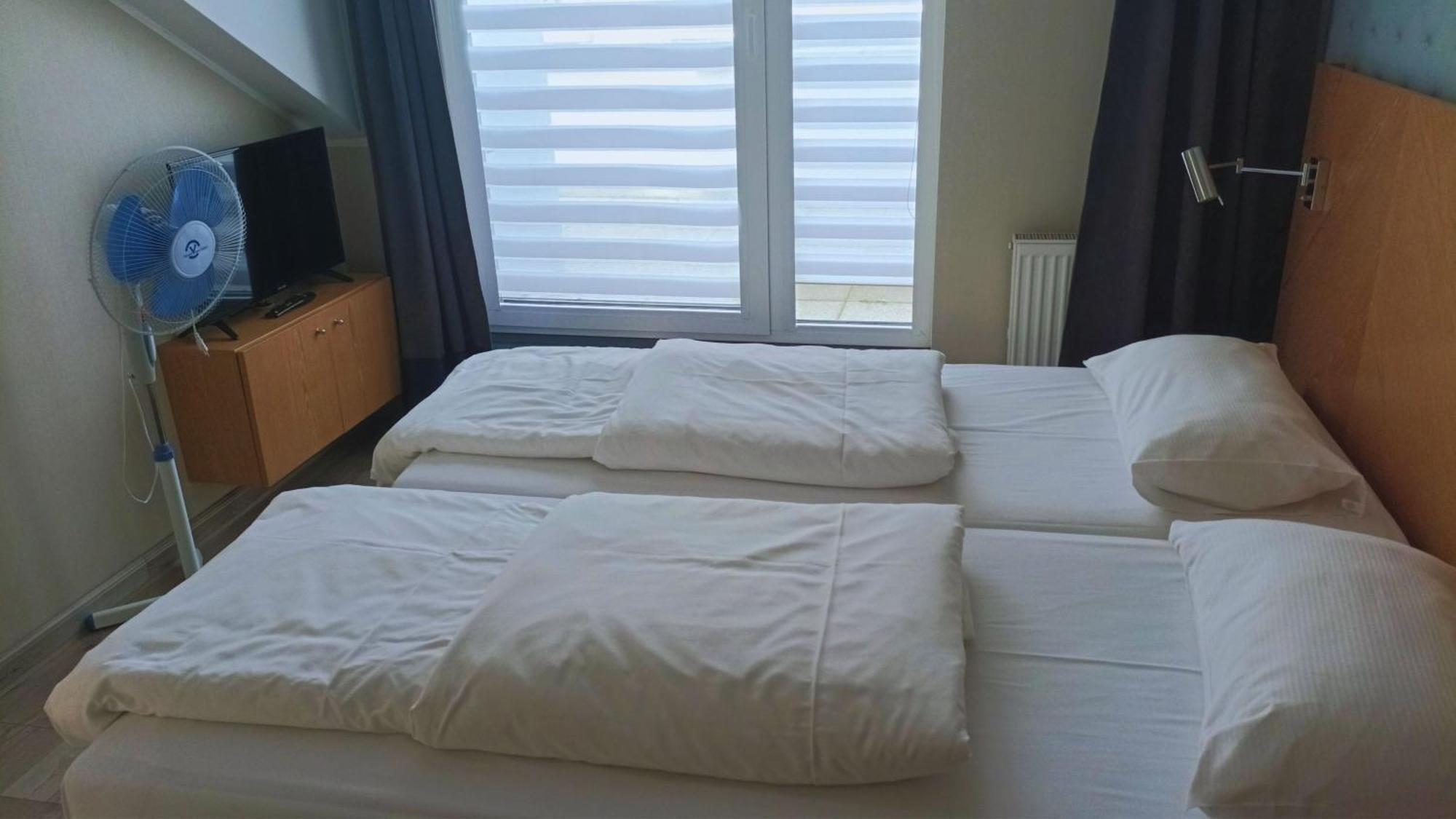 Two-Bedroom Apartment Balcony right next to the hotel