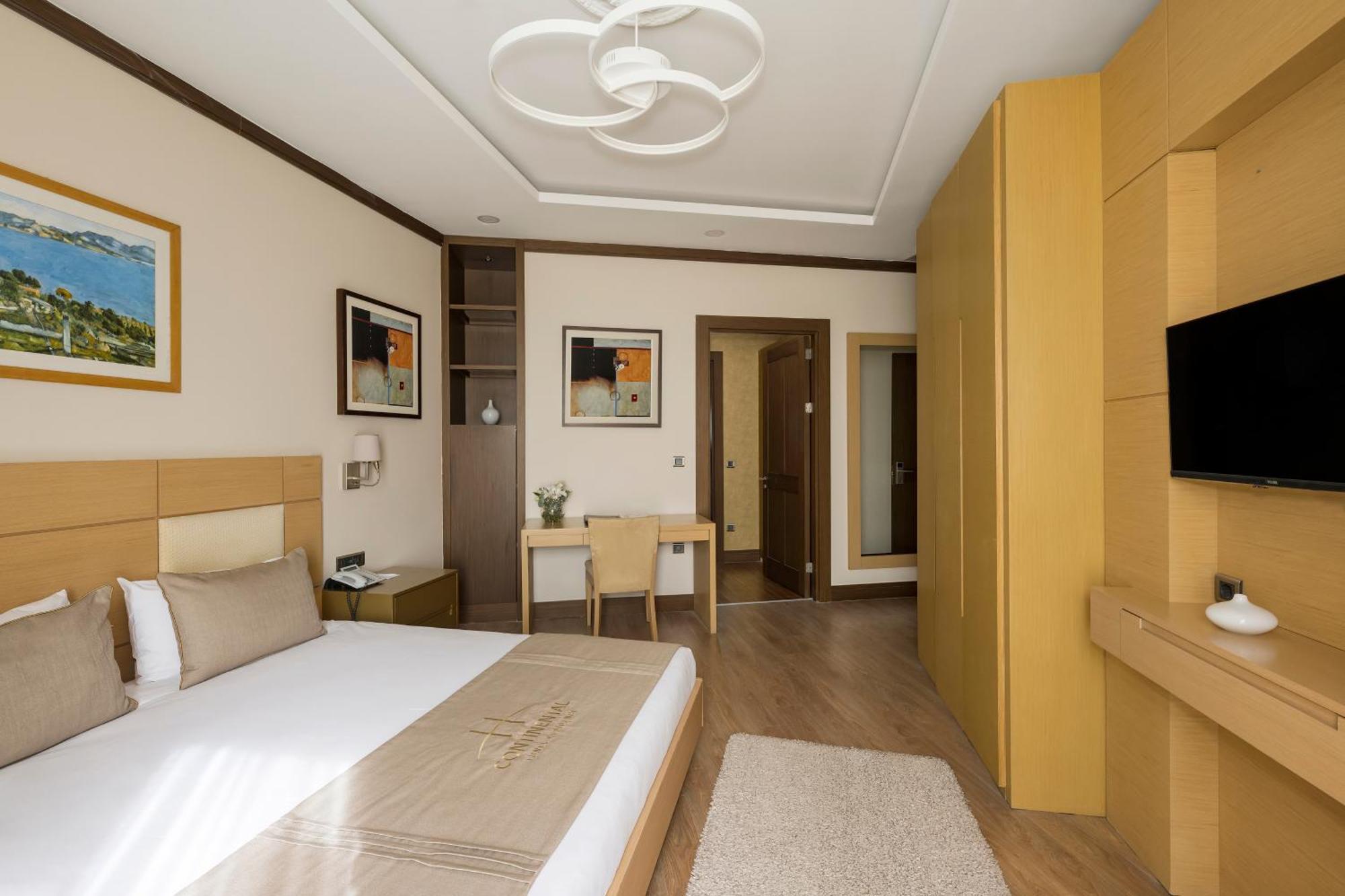 Kamer met Queensize Bed en Uitzicht op Zee