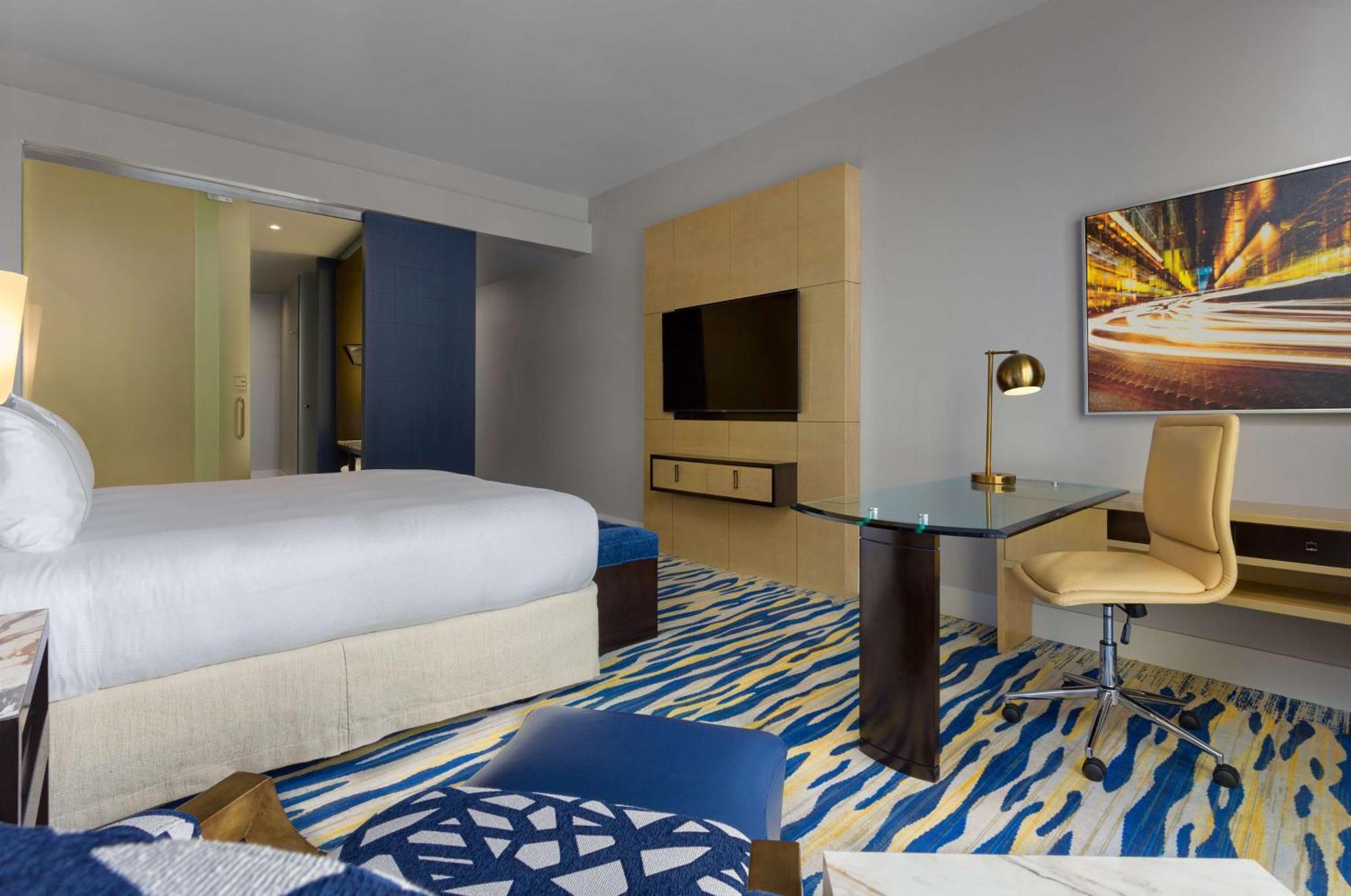 Habitación Doble Deluxe con cama extragrande y vistas a la ciudad