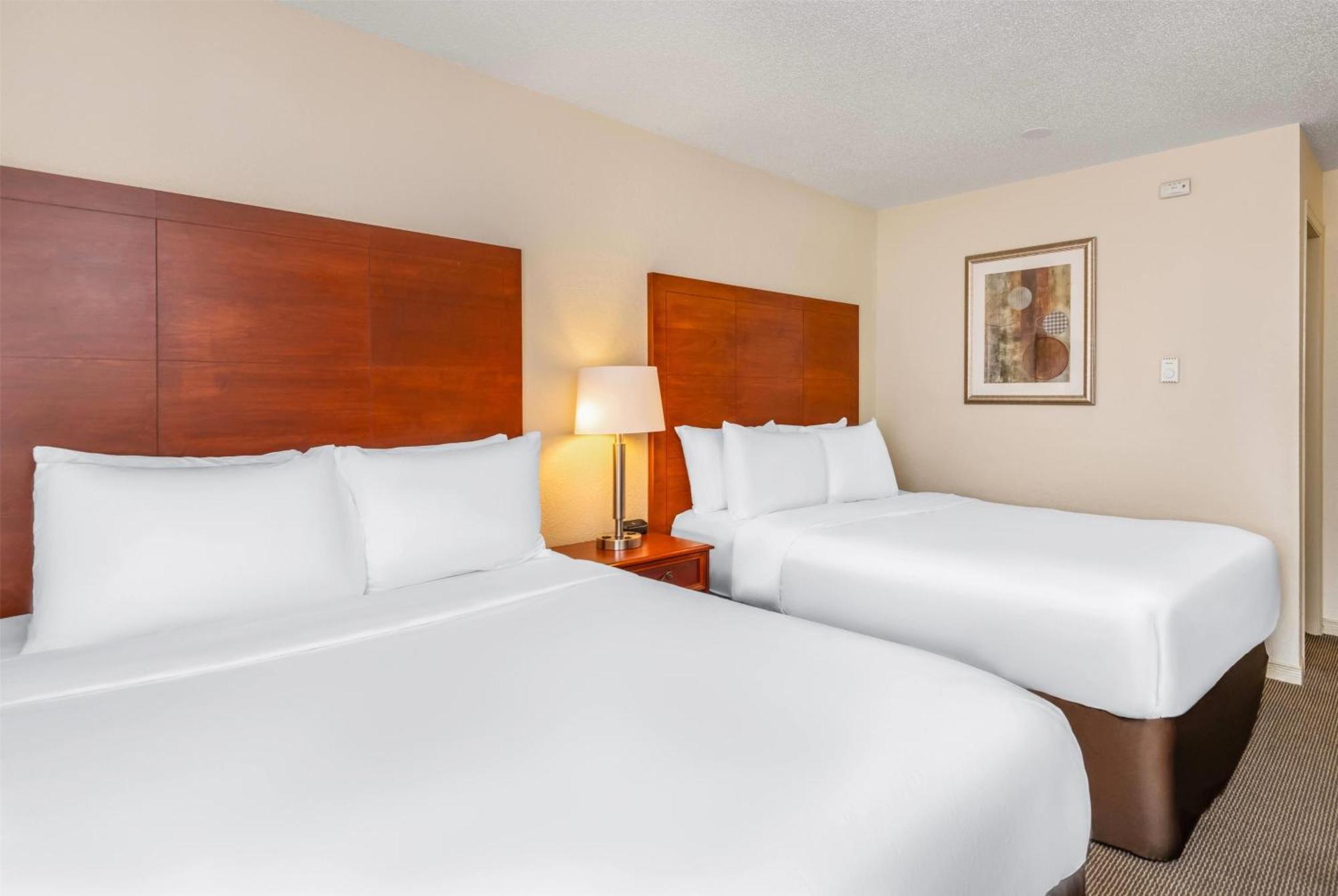 Queen Room with Two Queen Beds and Pool View -  Non-Smoking