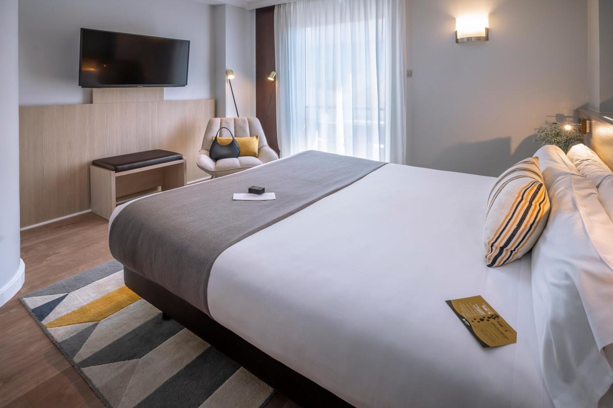 Quarto Deluxe com Cama de Casal ou 2 de Solteiro