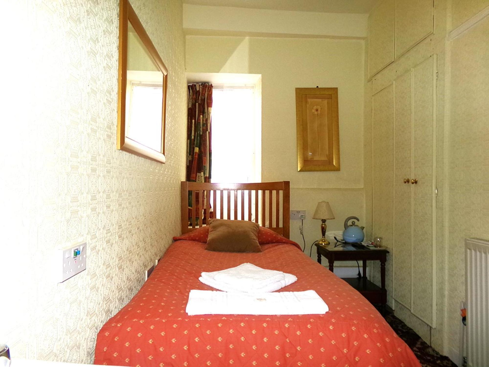 Single room shared toilet shower