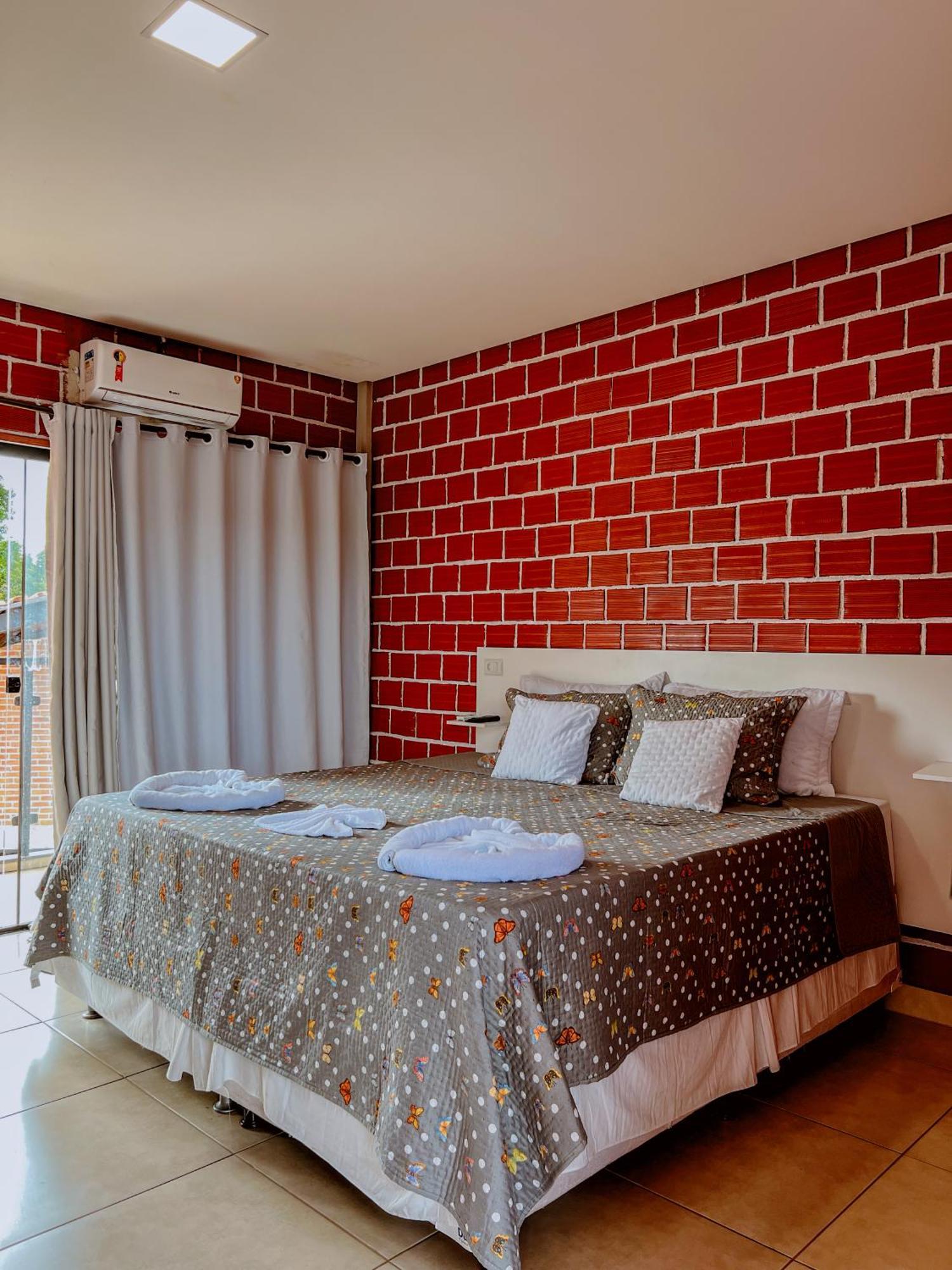 Quarto com Cama Queen-Size e Varanda