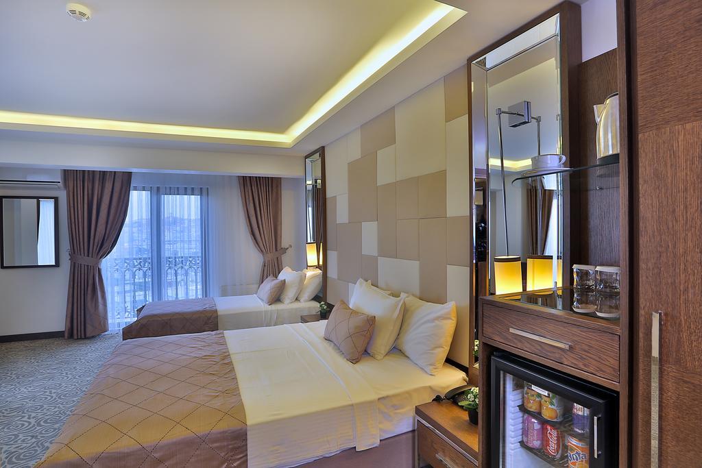 Deluxe Triple Room with Sea View,847007843:JPEG