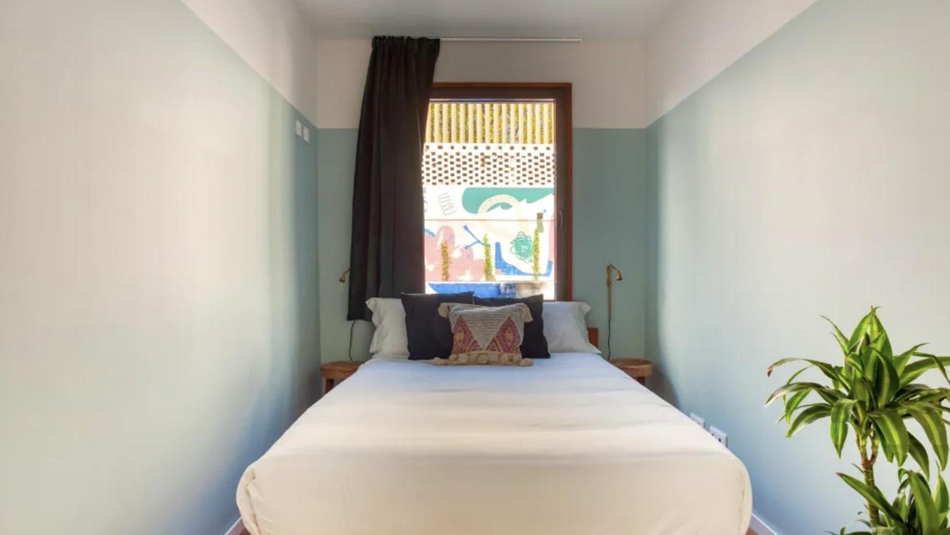 Compact Room - Double Bed with Shared Bathroom