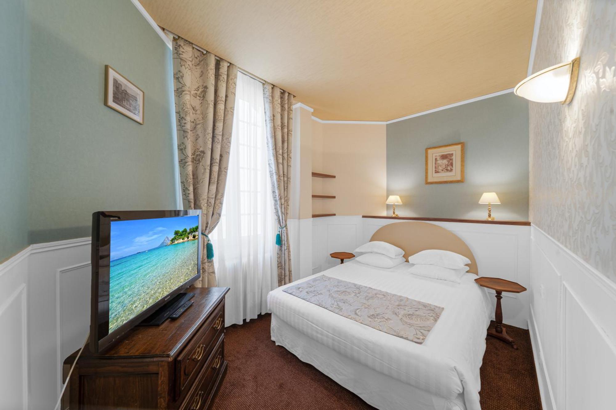 Chambre Triple Élégante