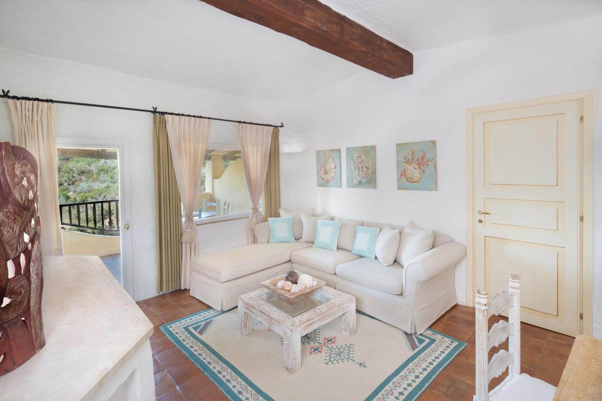 Two-bedroom Deluxe Suite King size bed pool or canal view terrace