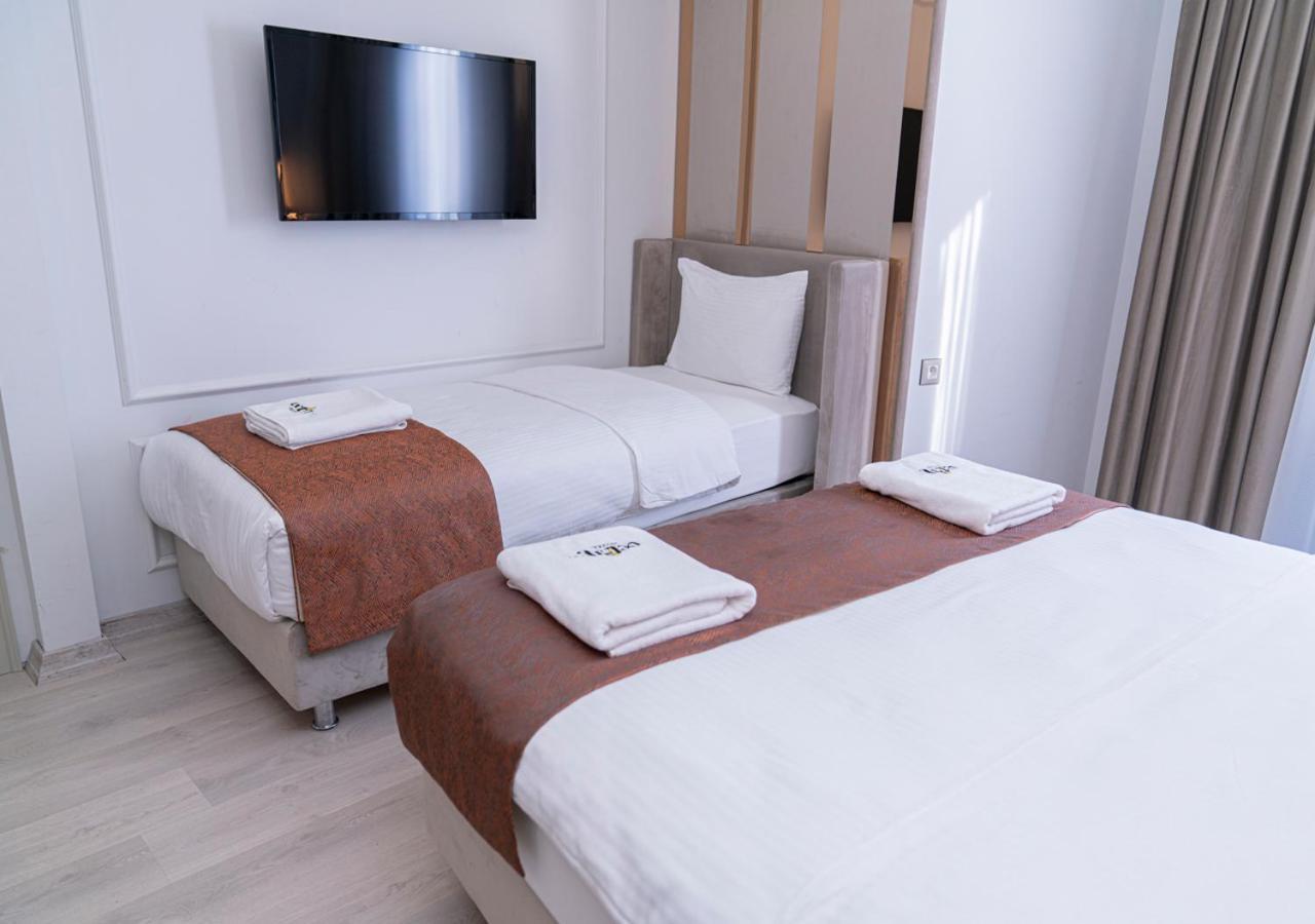 Tweepersoonskamer met 2 Aparte Bedden