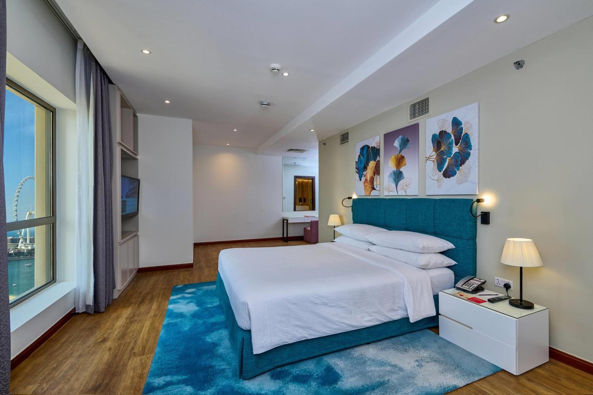 Suite King con 1 Camera da Letto e Vista Mare Parziale