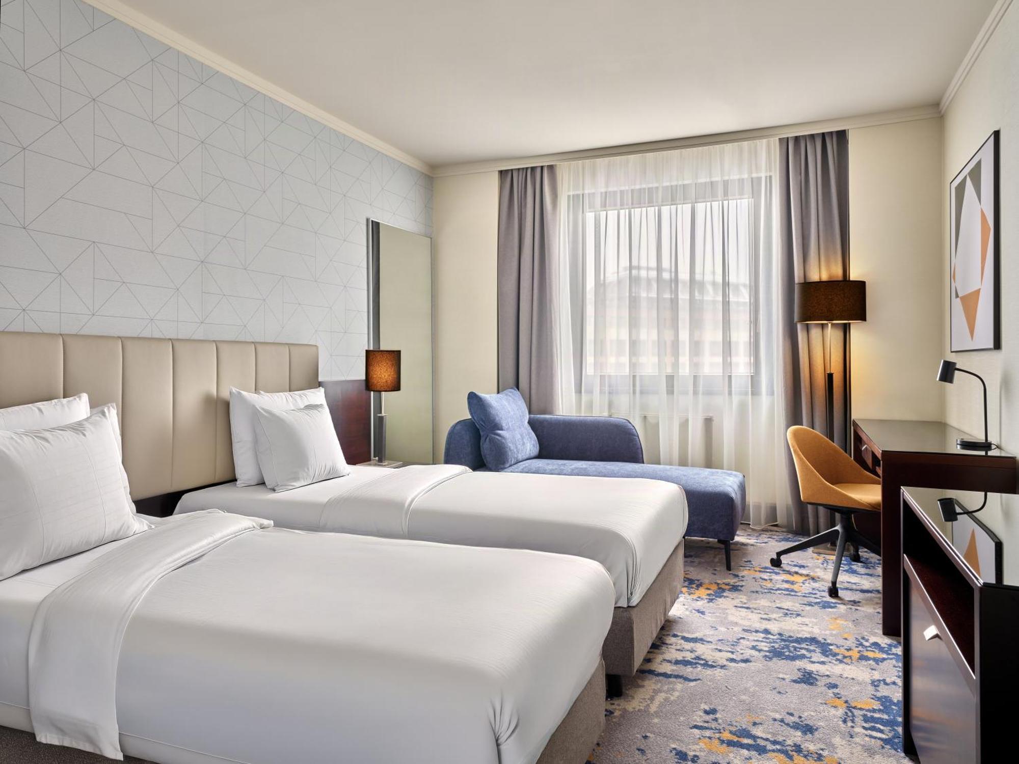 Quarto Premium com 2 Camas de Solteiro e Acesso à Área VIP