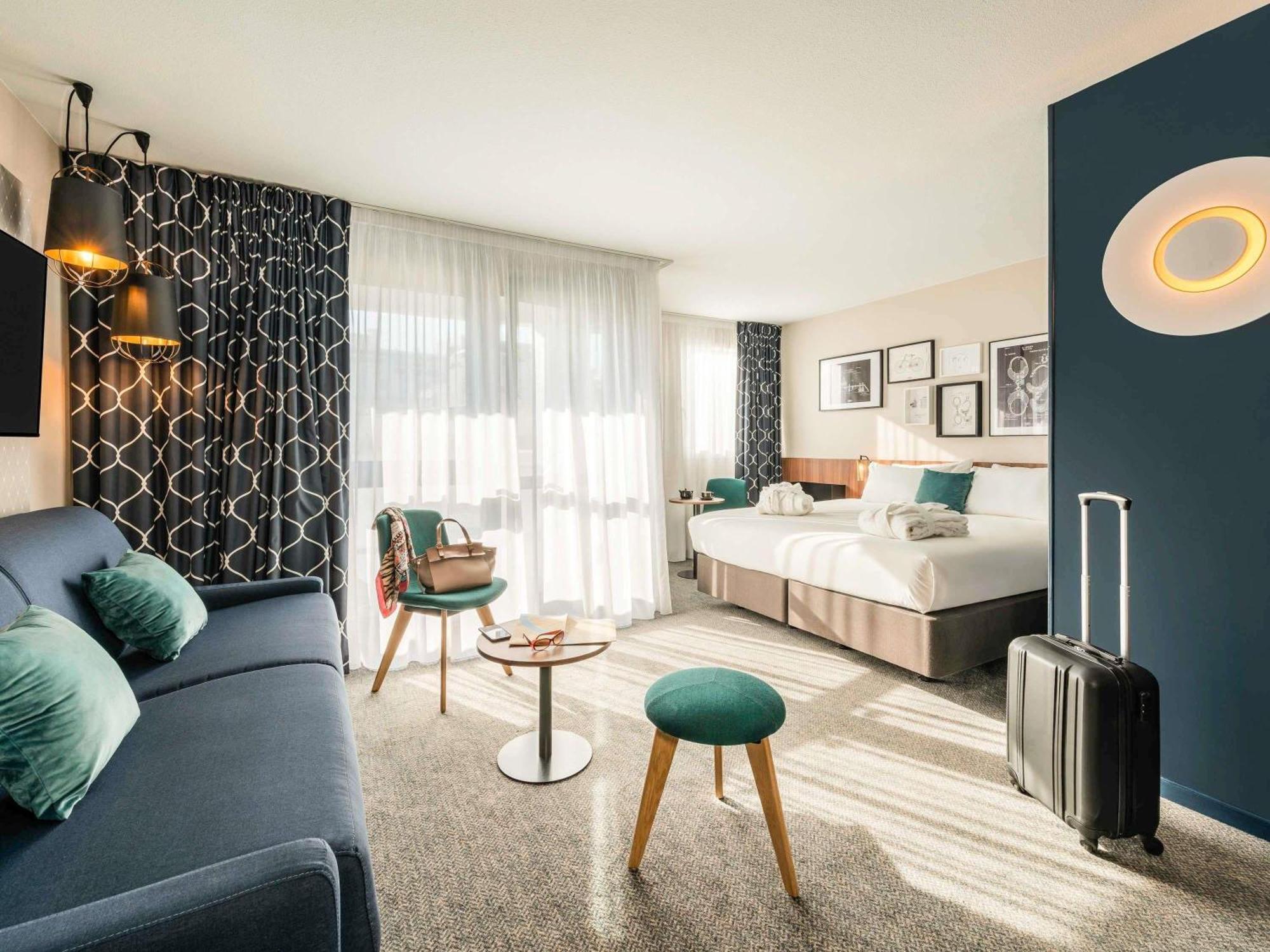 Superior Kamer met Queensize Bed en Bank