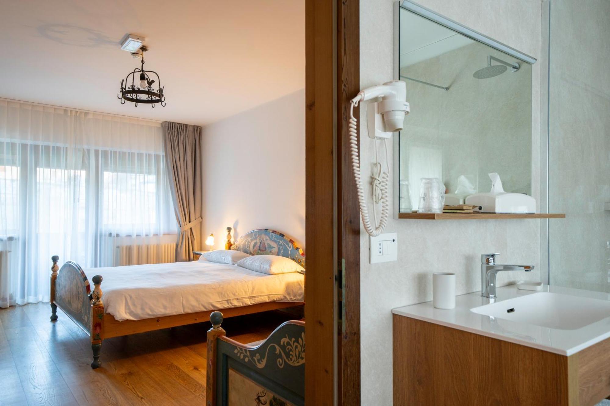 Dreibettzimmer mit Balkon