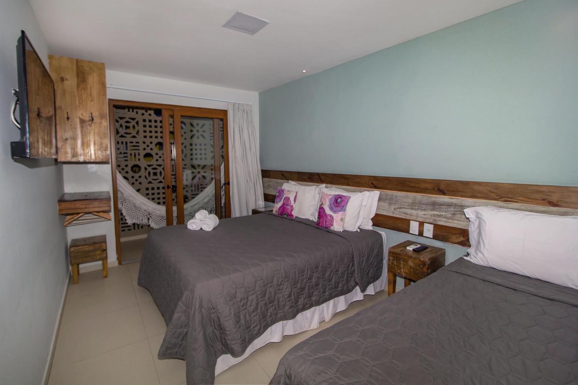 Quarto Triplo com Varanda