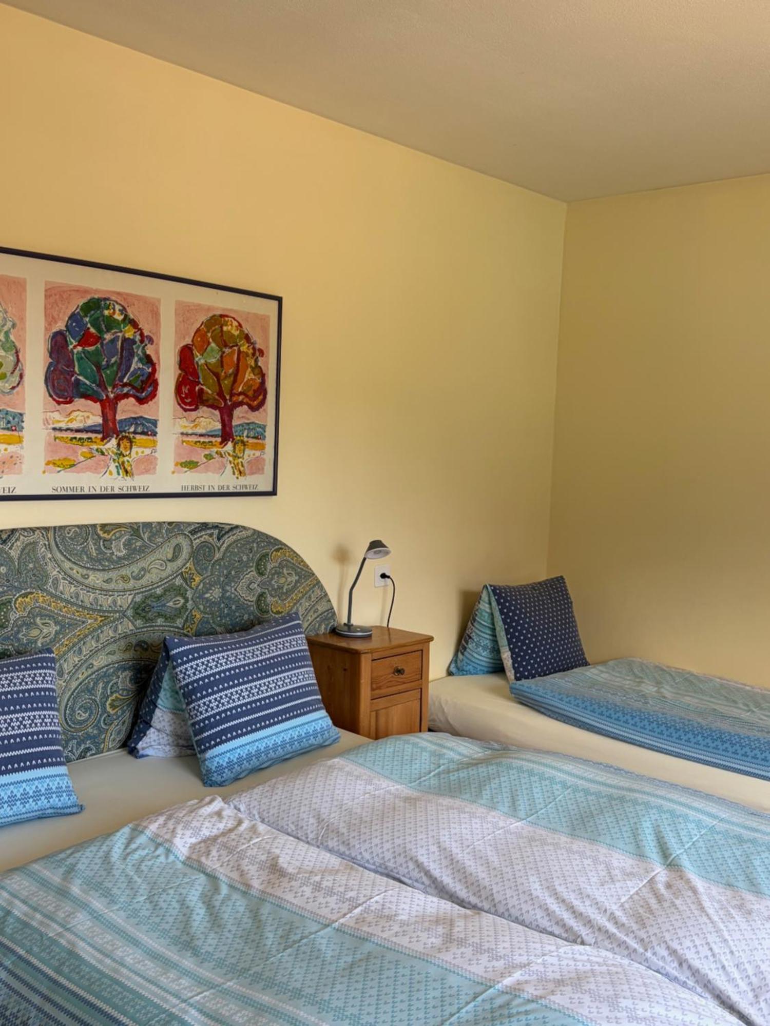 Dreibettzimmer mit Hafenblick und Gemeinschaftsbad