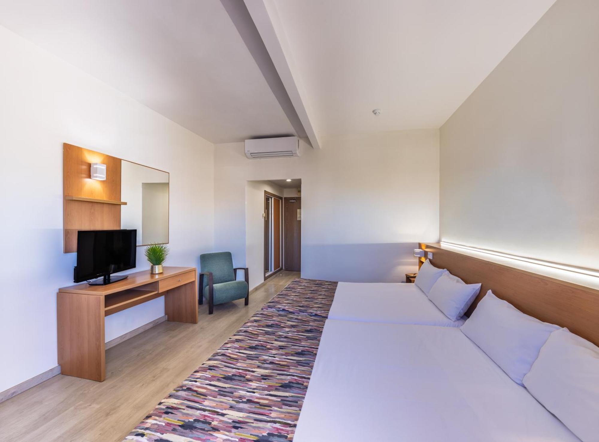 Habitación Triple (2 adultos + 1 niño)