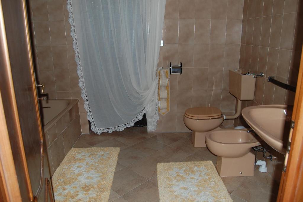 Camera Familiare con Bagno Privato Esterno