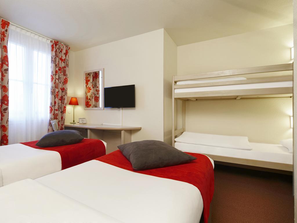 Camera Standard Doppia con Letti Singoli e Letto a Castello (1-4 Adulti)