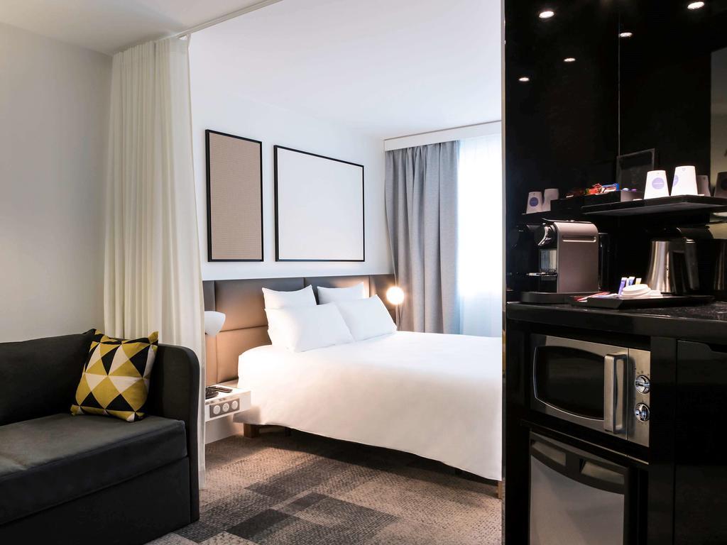 Executive Suite met Tweepersoonsbed en Slaapbank