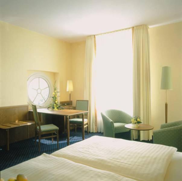 Doppel- oder Zweibettzimmer