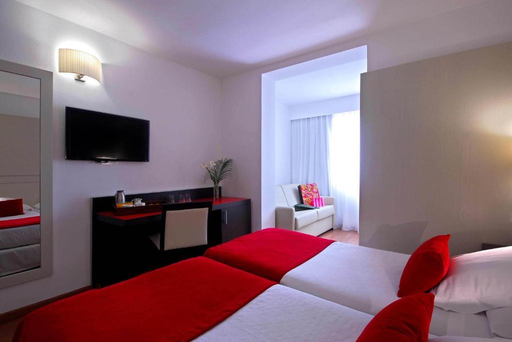 Habitación Doble con cama supletoria (3 adultos)