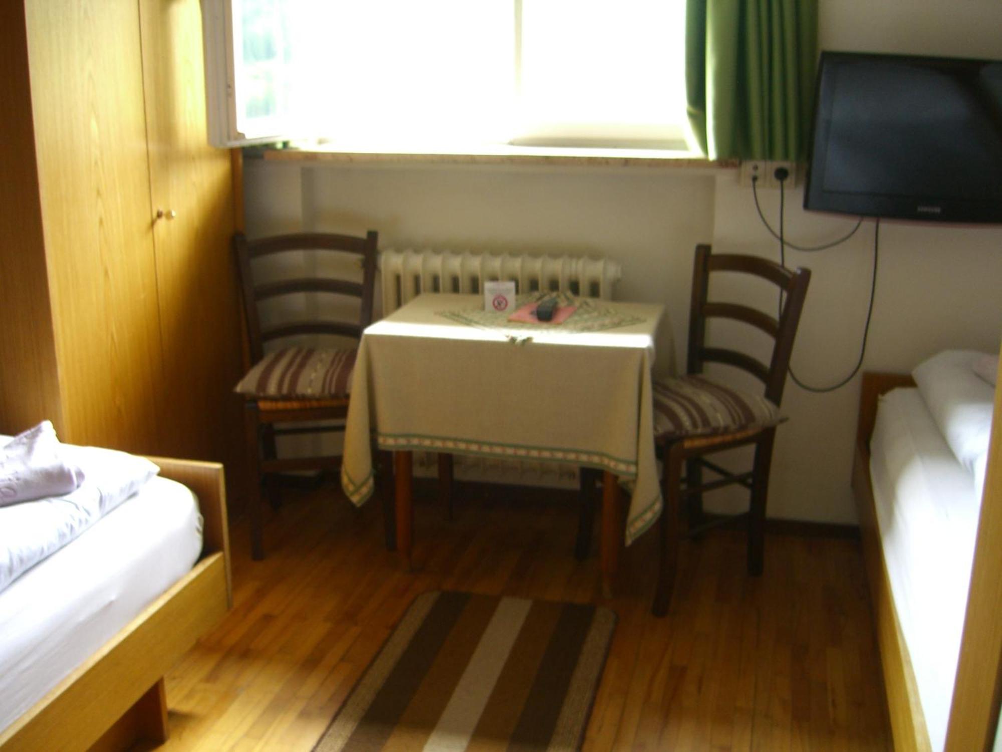 Tweepersoonskamer met 2 Aparte Bedden