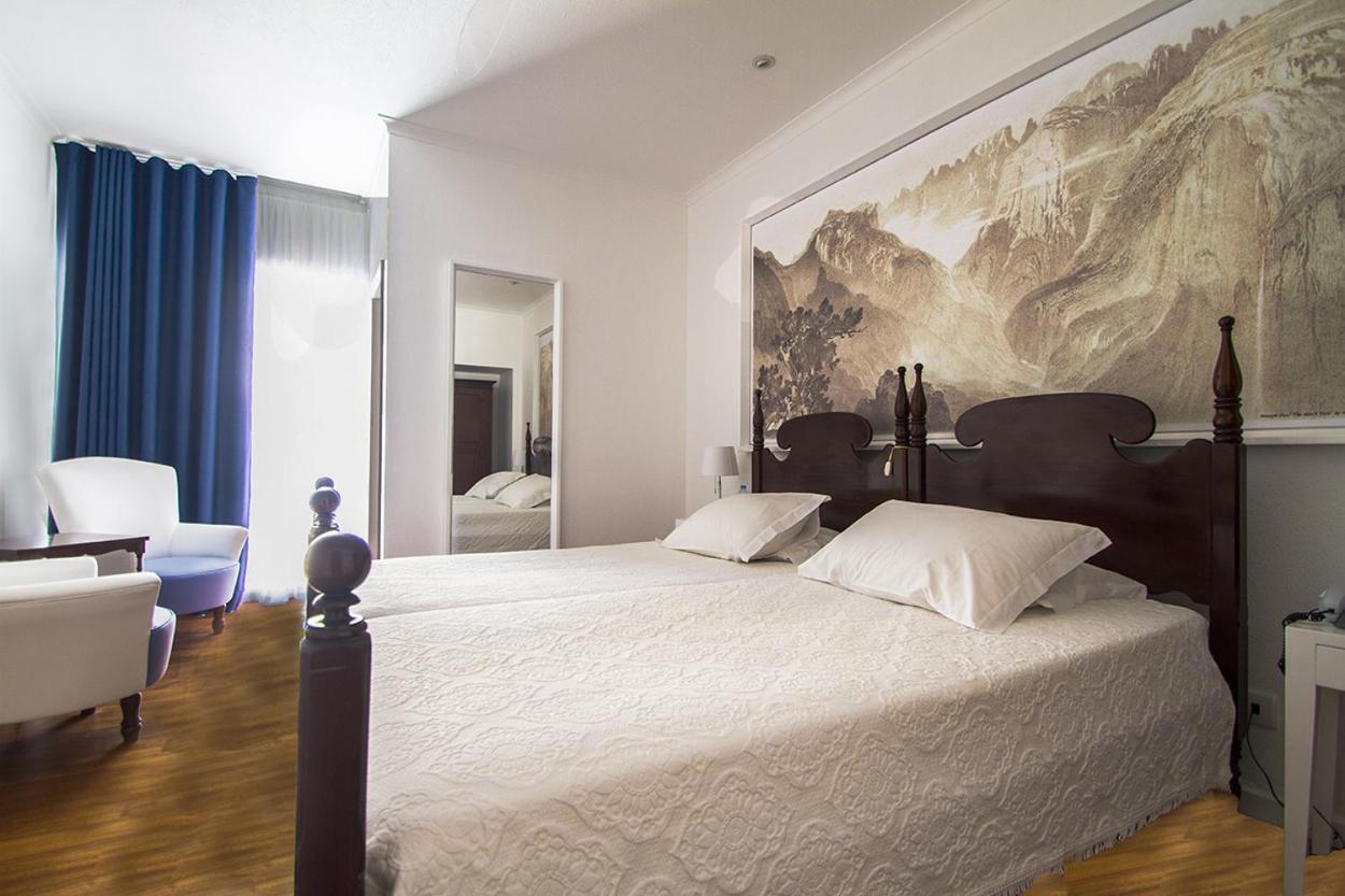 Luxe Kamer met 1 of 2 Bedden en Balkon