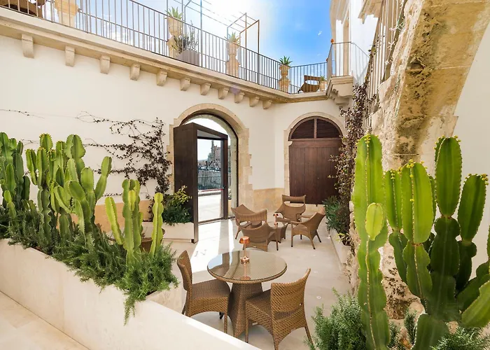  Maniace Boutique Ortigia | UNA Esperienze